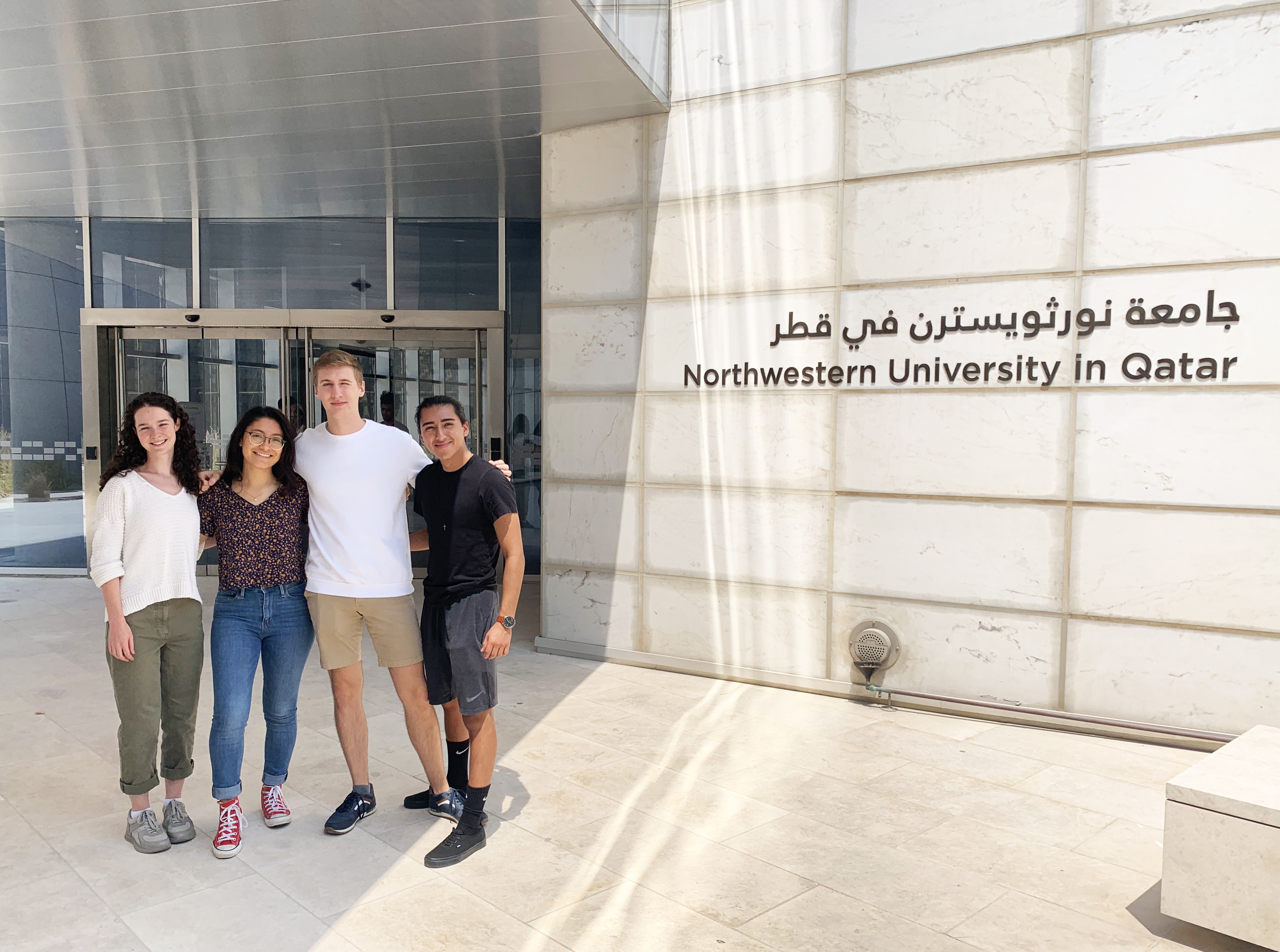 A group of four students from Evanston -- (l to r) Eliza Posner, Leslie Bonilla, Martin Herrmann, and Miguel Aponte -- are spending 16 weeks on Northwestern's Qatar campus to learn about and immerse themselves in the values and vibrancy of the Middle East.