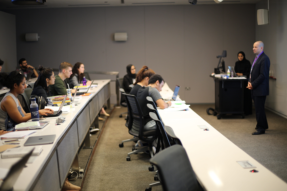 The exchange students enrolled in a unique interdisciplinary course, the Doha Seminar, which focuses on Qatar as a case study of issues that include the dynamic cultural interchange of modernity and tradition, economics and politics, and geography and trade. The seminar is taught by NU-Q Professor Zachary Wright (photographed). 