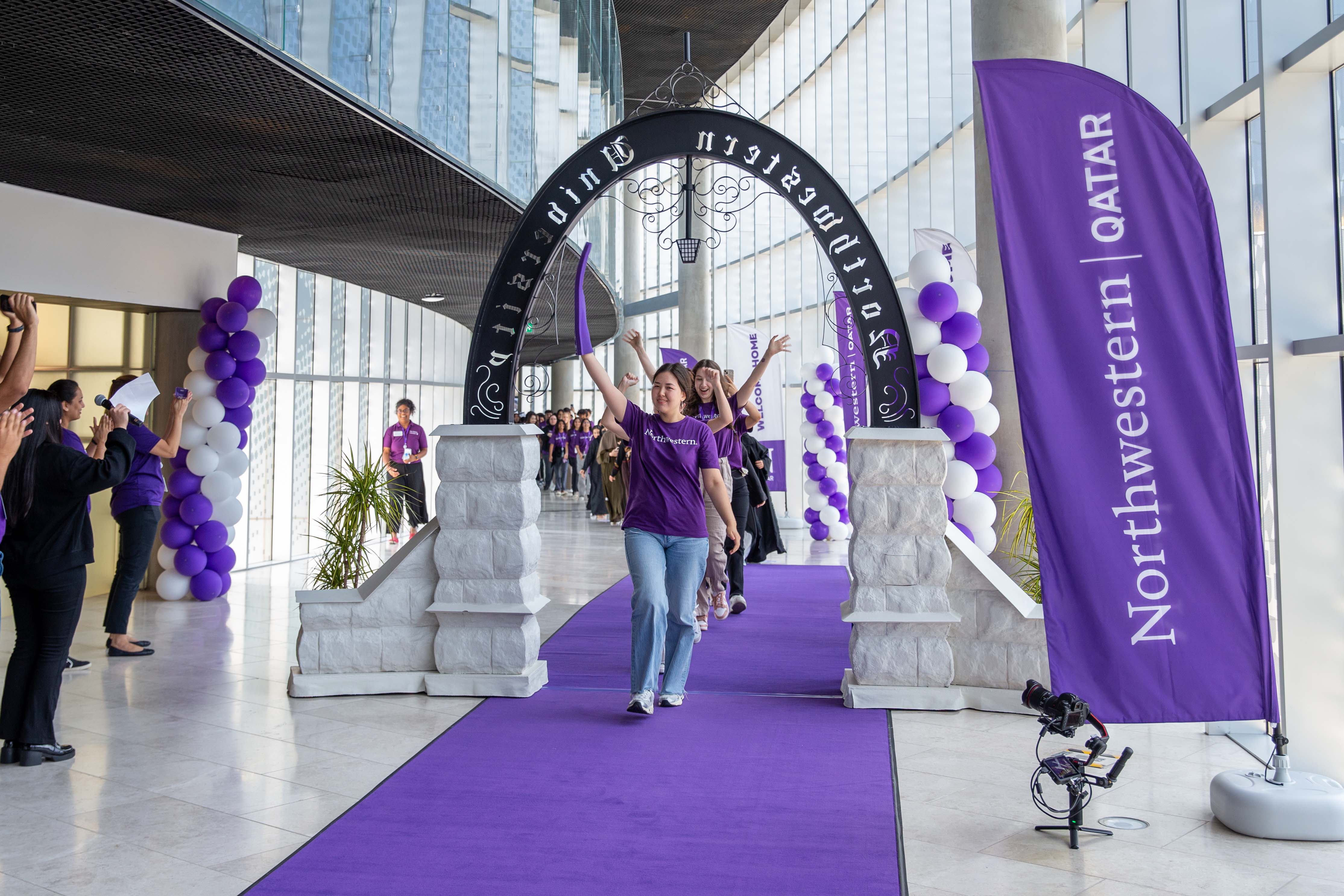 Class of 2027 participating in the annual tradition of March Through the Arch