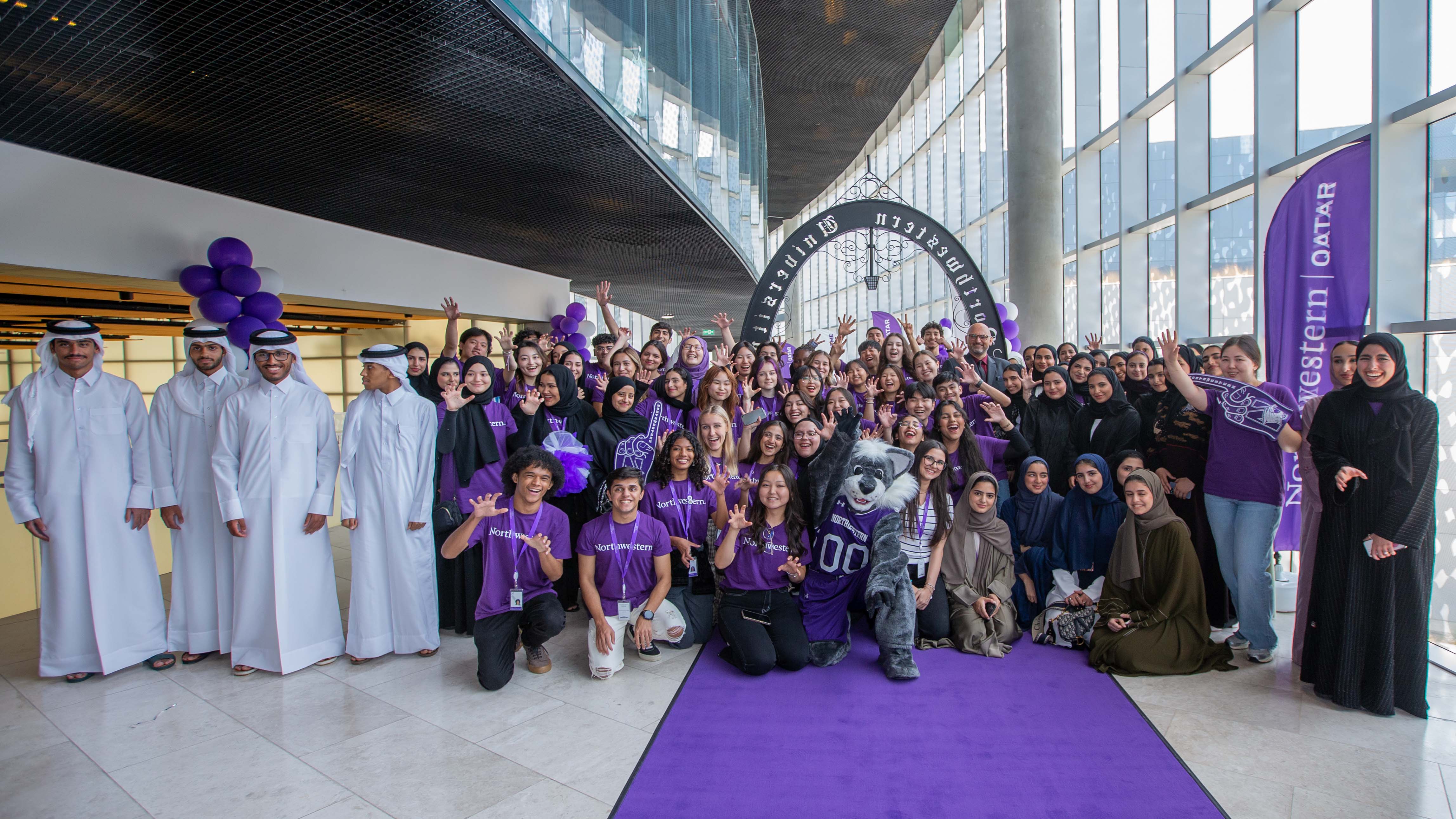 Class of 2027 gathered in front of the Weber Arch for the annual class photo with Dean Kraidy