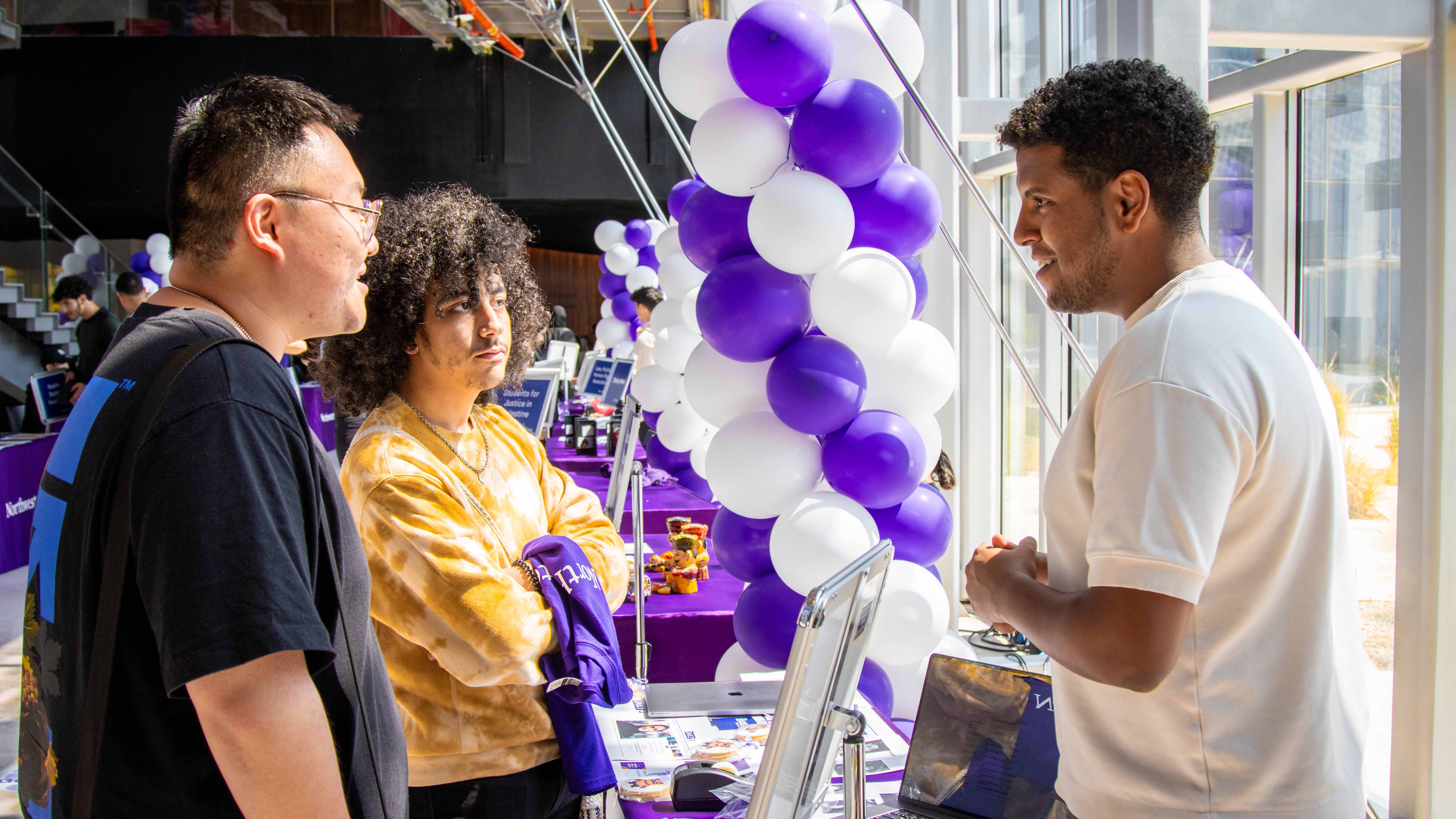 Incoming students learn about student life and student-led clubs in the school at the annual Wildcat Welcome Home fair