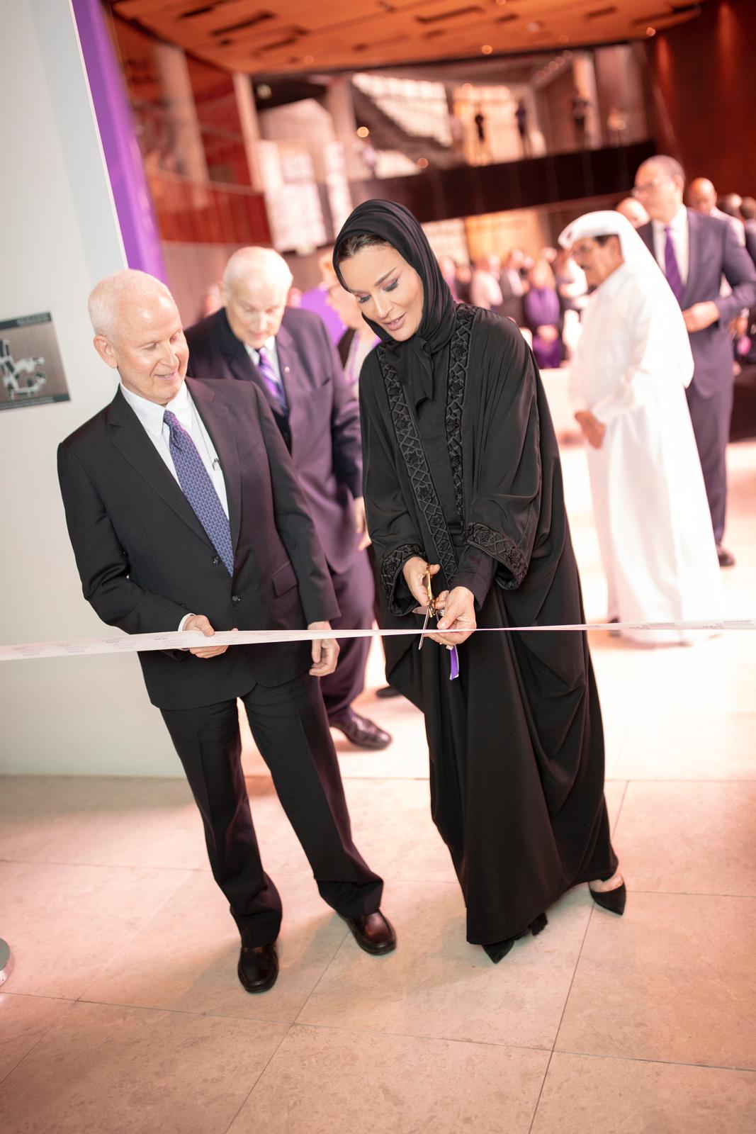 Her Highness Sheikha Moza bint Nasser joins Northwestern University President Morton Schapiro in cutting the ribbon to dedicate The Media Majlis at Northwestern University in Qatar