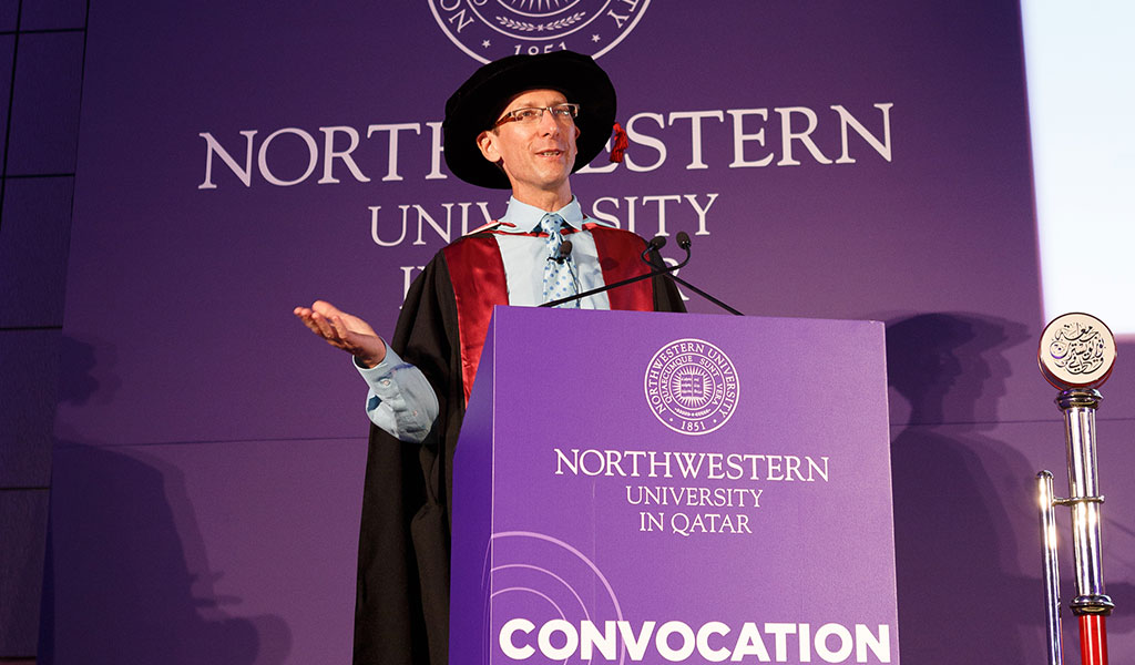 Author Jonathan Lyons addresses the NU-Q student body, faculty and staff
