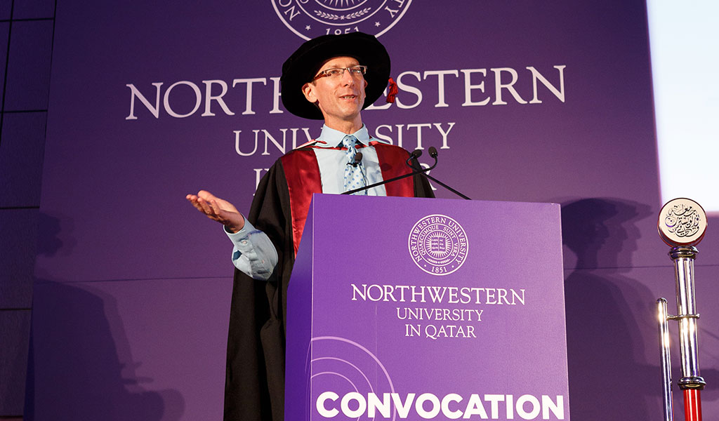 Author Jonathan Lyons addresses the NU-Q student body, faculty and staff