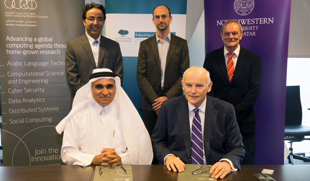 Standing (l to r): Abdellatif Saoudi, managing director, QCRI; Ingmar Weber, senior scientist, social computing, QCRI, Klaus Schoenbach, associate dean of research and professor in residence, NU-Q; Sitting (l to r): Ahmed Elmagarmid, executive director, QCRI and Everette E. Dennis, dean and CEO of NU-Q