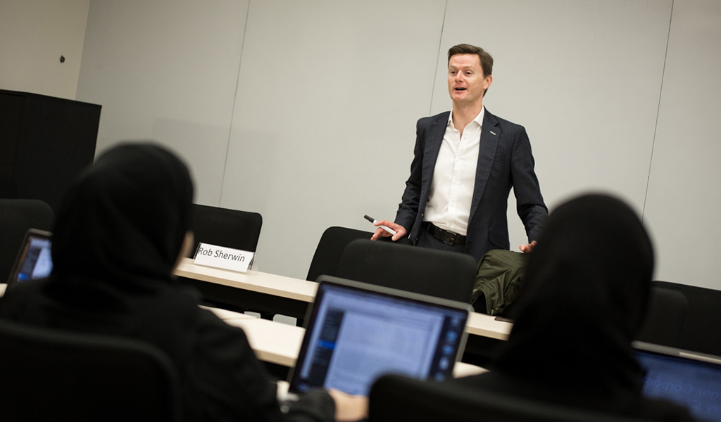 Rob Sherwin of Qatar Shell speaks with students at NU-Q