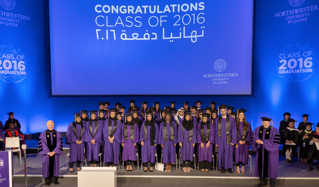 The Class of 2016 with Northwestern President Morton Schapiro (left) and NU-Q Dean Everette E. Dennis (right)