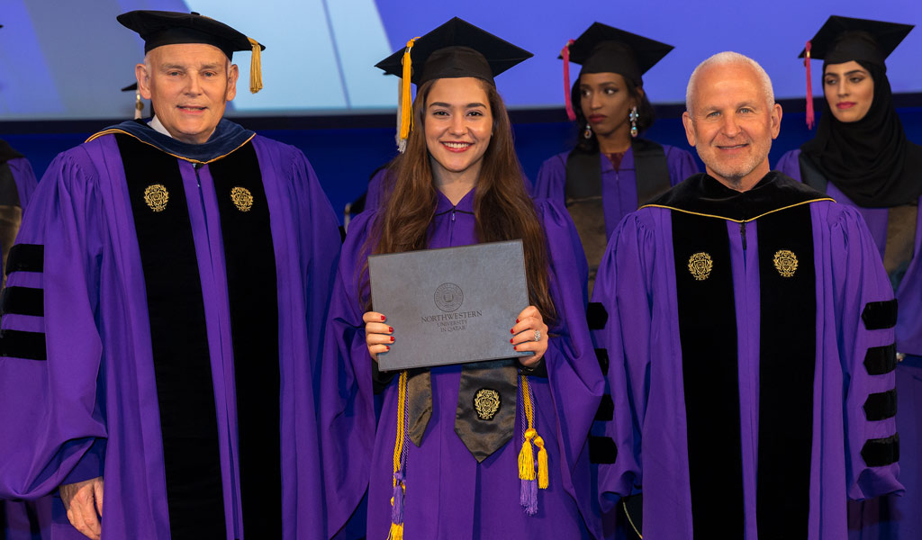 Layan Amin Abdul-Shkoor (center) with NU-Q Dean Everette E. Dennis (left) and Northwestern University President Morton Schapiro (right)