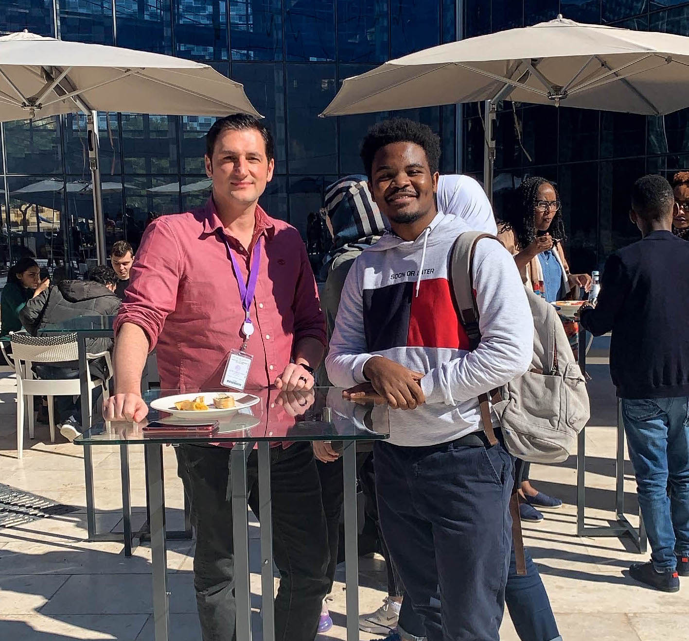 NU-Q Professor Spencer Striker (left) with one of his students Samson Mbogo.