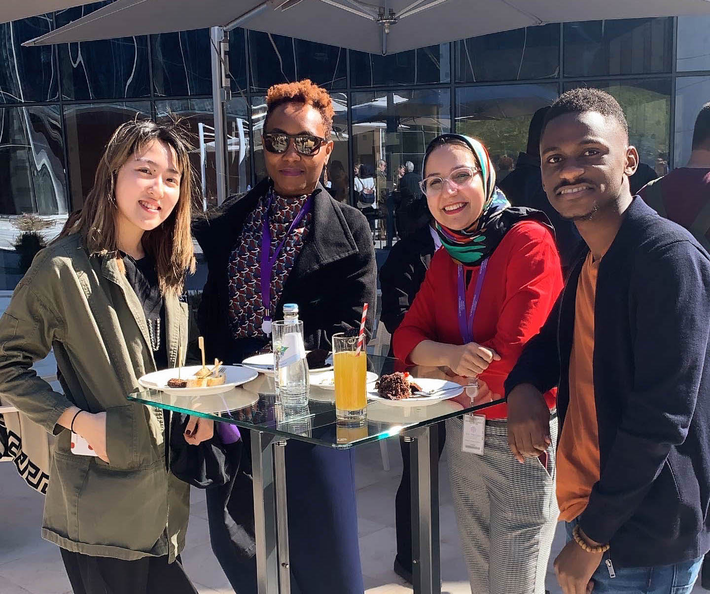 NU-Q students Yingyin Chen (far left) and Nesta Mwanansaluka (far right) with NU-Q librarians Victoria Ng'eno (center left) and Iman Khamis (center right).  